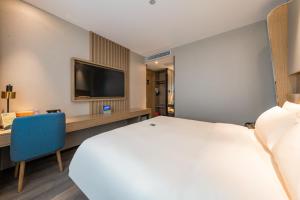TV a/nebo společenská místnost v ubytování Atour X Hotel Beijing Sanyuan Bridge