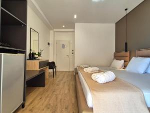 TV a/nebo společenská místnost v ubytování Augusto Rooms