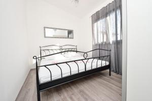 Posteľ alebo postele v izbe v ubytovaní Holiday home Jakov