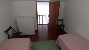 A bed or beds in a room at Impresionantes vistas del mar en Roses, Canyelles AV-37