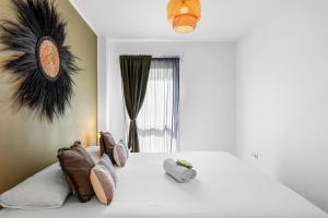 Łóżko lub łóżka w pokoju w obiekcie MEDANO4YOU Casa Toya