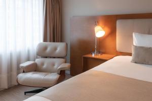 Ein Bett oder Betten in einem Zimmer der Unterkunft Dazzler by Wyndham Montevideo
