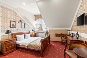 TV a/nebo společenská místnost v ubytování Hotel Diament Arsenal Palace Katowice - Chorzów