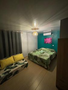 Rangi Pearl Lodge客房内的一张或多张床位