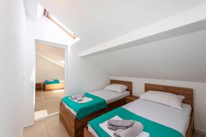 Posteľ alebo postele v izbe v ubytovaní Villa Christina