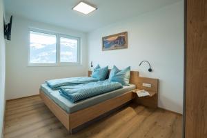 Posteľ alebo postele v izbe v ubytovaní Apart Ausblick