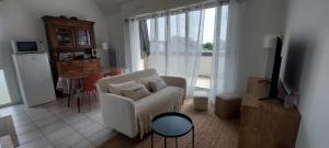 Et tv og/eller underholdning på Appartement 4 personnes, idéal pour les familles