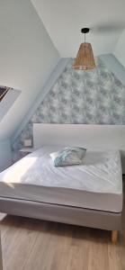 Postel nebo postele na pokoji v ubytování Gîte ramloc