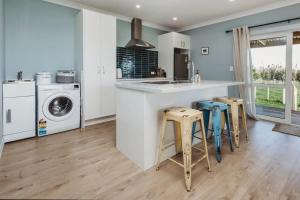 ครัวหรือมุมครัวของ Weld Cottage - Sustainable lifestyle property