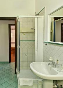 a bathroom with a sink and a shower at Casa Delia, apartment close the sea in Vietri sul Mare