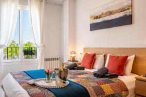 a bedroom with a bed with a table on it at Casa Albatros - Poolside Retreat in Torre-Pacheco +36 photos