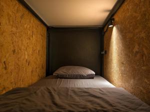 Ein Bett oder Betten in einem Zimmer der Unterkunft TIMN Hostel Female Only