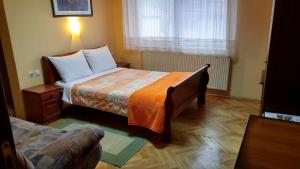 Ein Bett oder Betten in einem Zimmer der Unterkunft Hotel Čile