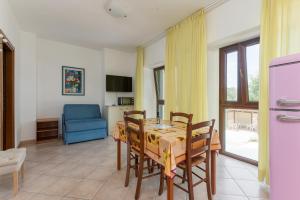 A television and/or entertainment centre at Agriturismo Le Vecchie Scuole