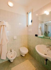Koupelna v ubytování Hotel Jonni