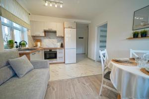 Kuchyň nebo kuchyňský kout v ubytování Soft Apartamenty na Starówce
