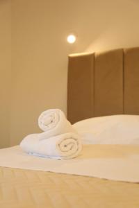 Ένα ή περισσότερα κρεβάτια σε δωμάτιο στο St James Apartments Medjugorje
