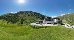 an aerial view of a building on a mountain at Hotel Olympia in Obergurgl