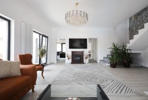 TV a/nebo společenská místnost v ubytování Grey House