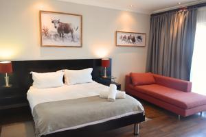 Postel nebo postele na pokoji v ubytování BergWood Inn + 37 fotografií