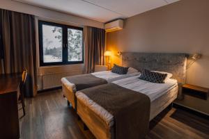 Katil atau katil-katil dalam bilik di Hotel Haikko Manor & Spa +137 gambar