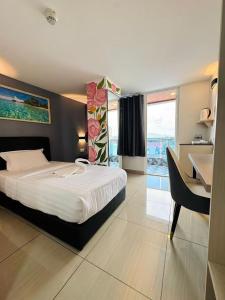 Postel nebo postele na pokoji v ubytování 阳光精品酒店Sunshine boutioue hotel