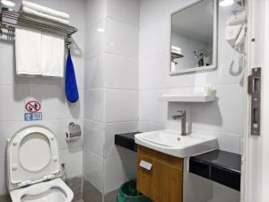 Koupelna v ubytování 阳光精品酒店Sunshine boutioue hotel + 17 fotografií