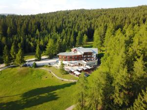 an aerial view of a large building on a hill at Il Falchetto in Sarnonico