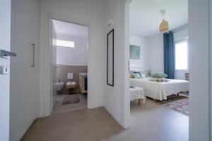 Postel nebo postele na pokoji v ubytování Casa Bilum