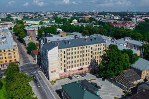 Nespecifikovaný výhled na destinaci Riga nebo výhled na město při pohledu z aparthotelu