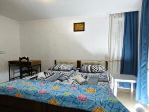 Postel nebo postele na pokoji v ubytování Guesthouse Mery