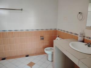 Koupelna v ubytování Natol Homestay - Kuching Home Penthouse Airport Road
