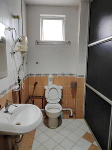 Koupelna v ubytování Natol Homestay - Kuching Home Penthouse Airport Road