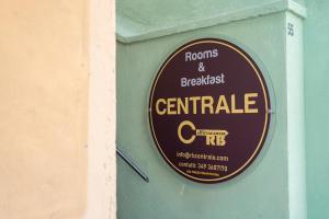 a sign for a restaurant on the side of a wall at Rooms & Breakfast Centrale in Fabriano