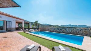 Bazén v ubytování Villa Rosa de Cómpeta Canillas de Albaida by Ruralidays nebo v jeho okolí