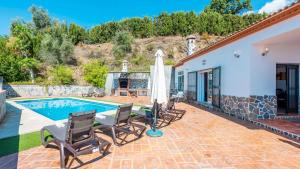 Bazén v ubytování Villa Rosa de Cómpeta Canillas de Albaida by Ruralidays nebo v jeho okolí