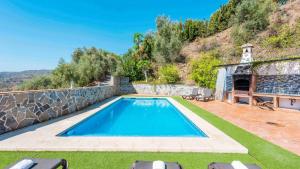 Bazén v ubytování Villa Rosa de Cómpeta Canillas de Albaida by Ruralidays nebo v jeho okolí