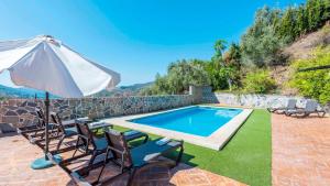 Bazén v ubytování Villa Rosa de Cómpeta Canillas de Albaida by Ruralidays nebo v jeho okolí