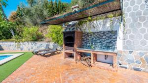 Bazén v ubytování Villa Rosa de Cómpeta Canillas de Albaida by Ruralidays nebo v jeho okolí