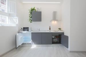 Kuchyňa alebo kuchynka v ubytovaní ALIMENTA open space city center