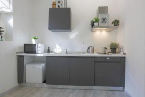 Kuchyňa alebo kuchynka v ubytovaní ALIMENTA open space city center
