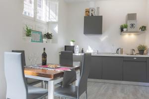 Kuchyňa alebo kuchynka v ubytovaní ALIMENTA open space city center