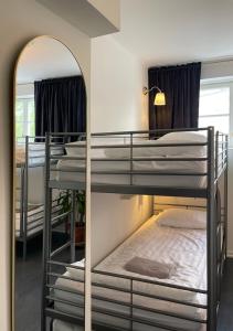Postel nebo postele na pokoji v ubytování Crafoord Place Hostel