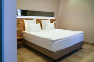 Letto o letti in una camera di Old Ijevan Boutique Hotel