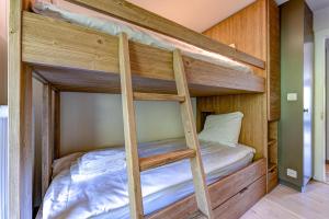 Postel nebo postele na pokoji v ubytování Appartement LaForet 62