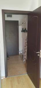 a door leading into a room with a closet at Квартира студия Villa Astoria 2 Болгария Солнечный берег in Elenite