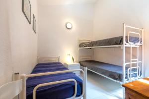 Ένα ή περισσότερα κρεβάτια σε δωμάτιο στο Villino Rifugio