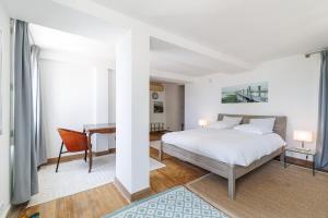 Łóżko lub łóżka w pokoju w obiekcie Villa Ocean Breeze