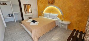 Ліжко або ліжка в номері Hotel Palladion