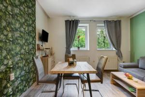 TV a/nebo společenská místnost v ubytování Ferienwohnung Classic